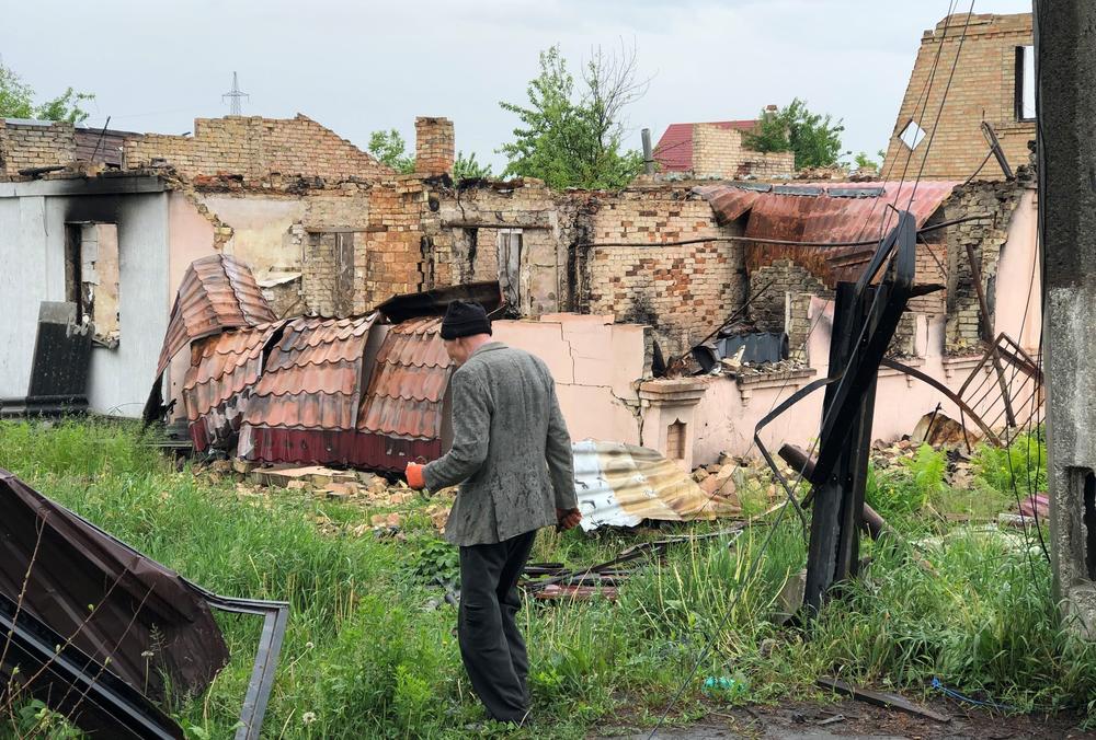 Valentyn Lipatiev, 71, visits his destroyed house on Vokzal'na Street. 'I saw the Russian tanks roll in, and I saw them shooting down this street,' he said. 'I saw this war unfold outside my living room window before my very own eyes,