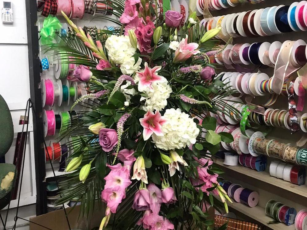 A floral arrangement honors a victim of the school shooting in Uvalde, Texas.