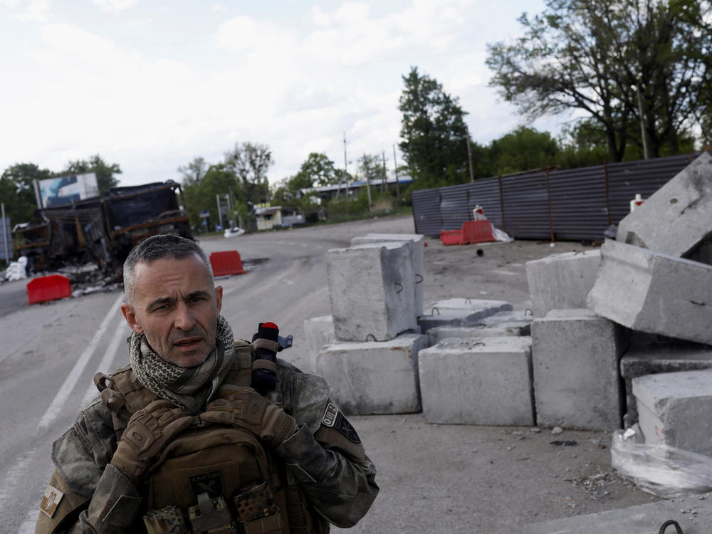 Business leader turned military commander Vsevolod Kozhemyako stands at a position in Ruska Lozova, a village retaken by the Ukrainian forces in the Kharkiv region, May 16.