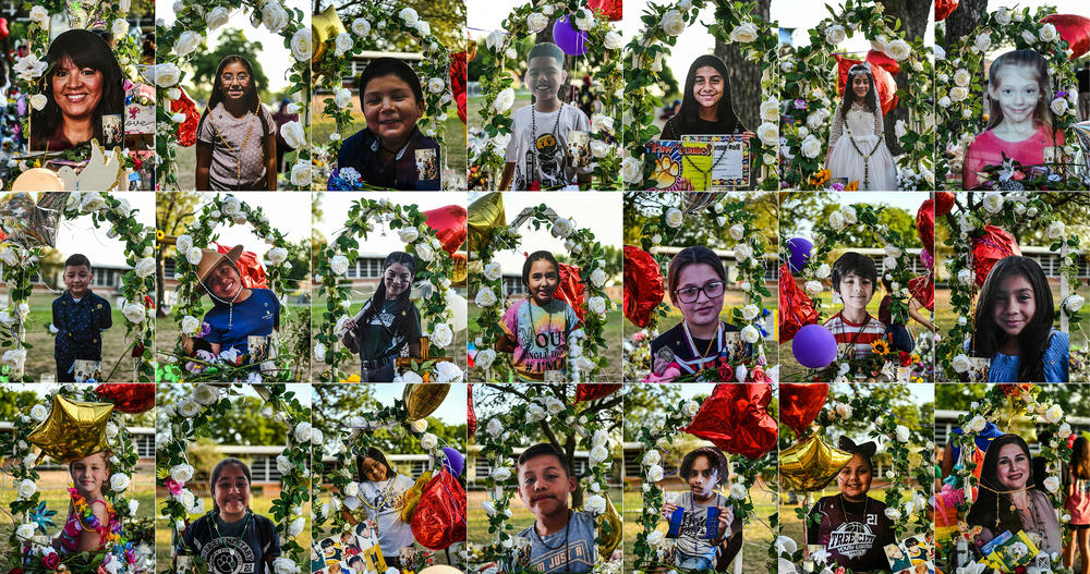 A combination of photos of 19 children and 2 teachers who died in the mass shooting are displayed at a makeshift memorial at Robb Elementary school in Uvalde, Texas.