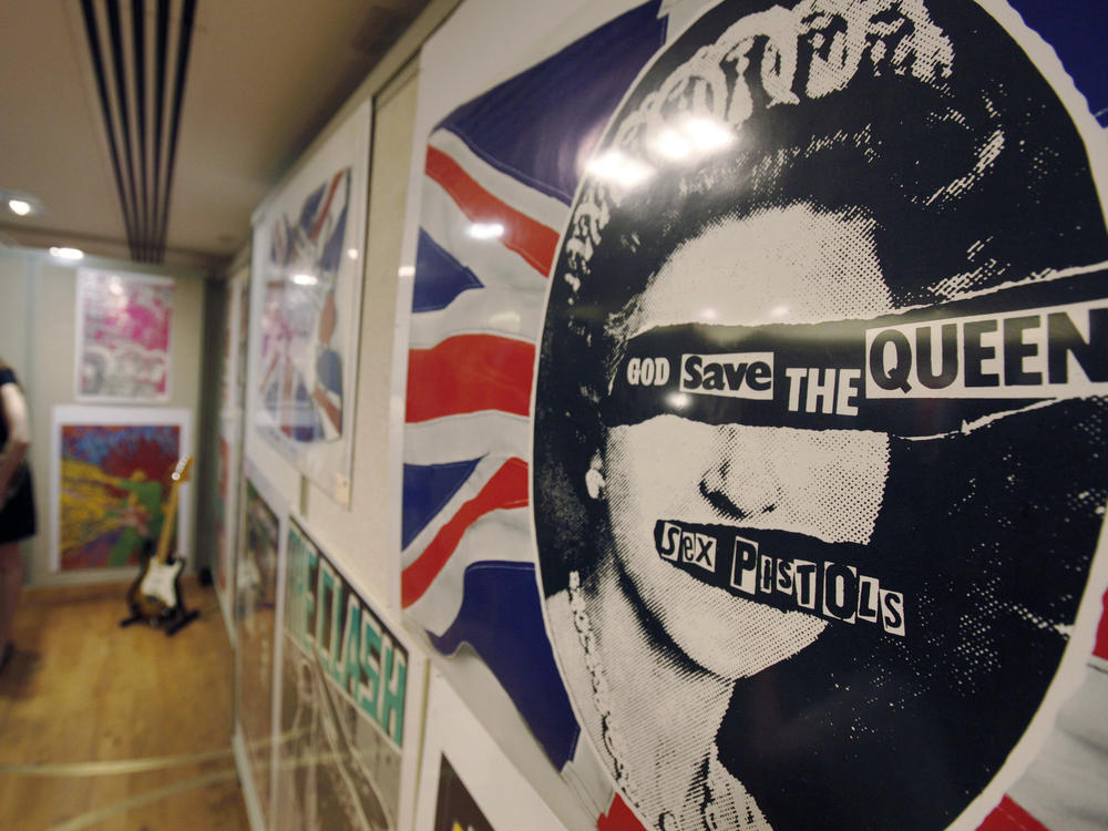 A promotional poster for the 1977 single God Save The Queen by the Sex Pistols on display, during a photo-op ahead of a rock and pop memorabilia auction, in central London, Thursday June 25, 2009.