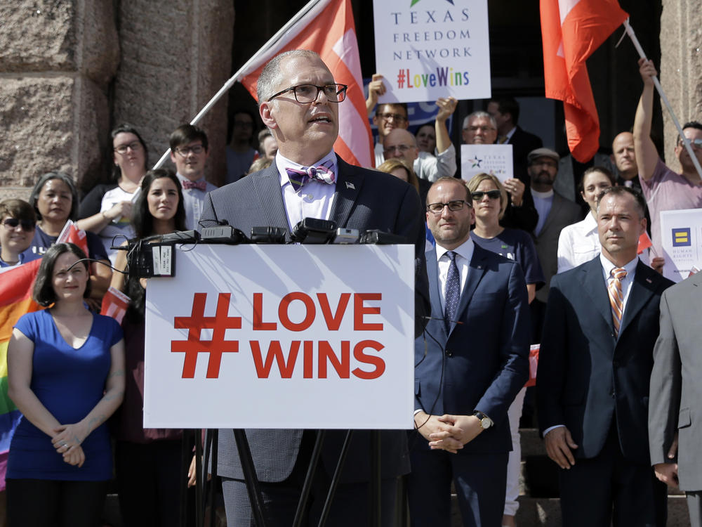 Jim Obergefell, the named plaintiff in the <em>Obergefell v. Hodges</em> Supreme Court case that legalized same-sex marriage, stands at the Texas Capitol during a rally on June 29, 2015.