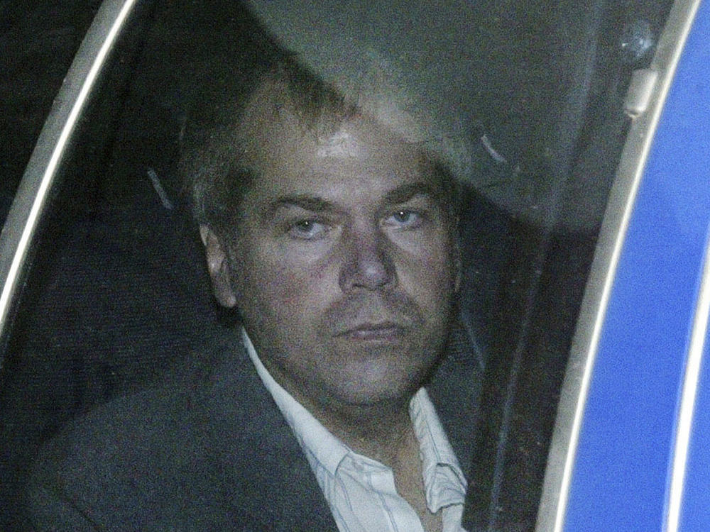 John Hinckley arrives at U.S. District Court in Washington in 2003. A judge said Hinckley's release from conditions would occur as planned June 15.