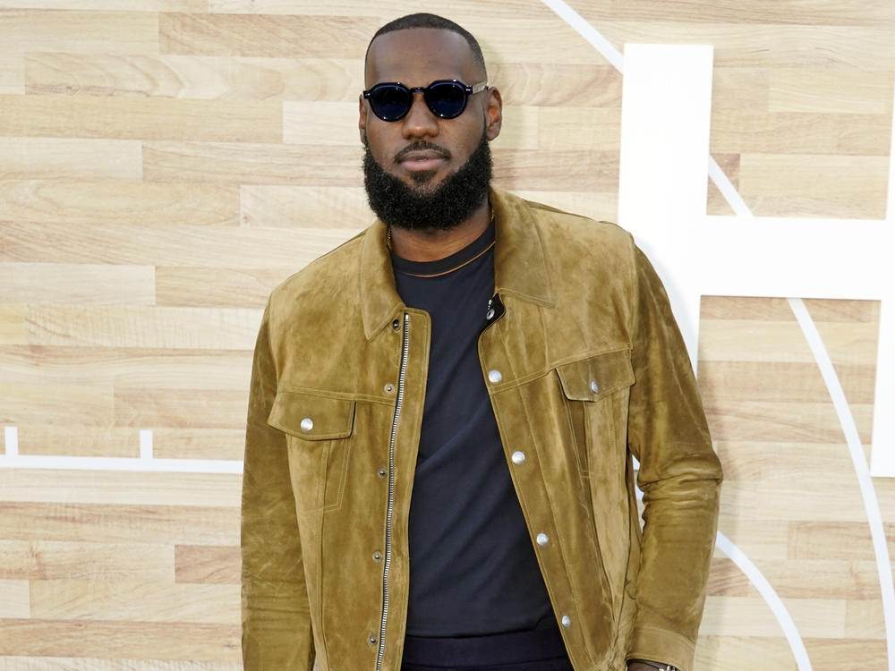 LeBron James poses at the premiere of the film <em>Hustle</em> on June 1 at the Regency Village Theatre in Los Angeles. James' net worth recently broke $1 billion, making him the first ever active NBA player to become a billionaire.