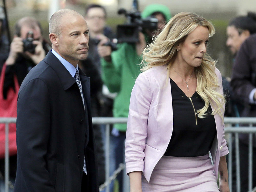 Stormy Daniels and her attorney Michael Avenatti leave federal court in New York, on April 16, 2018. Avenatti was sentenced Thursday to four years in prison for cheating client Daniels of hundreds of thousands of dollars in book proceeds.