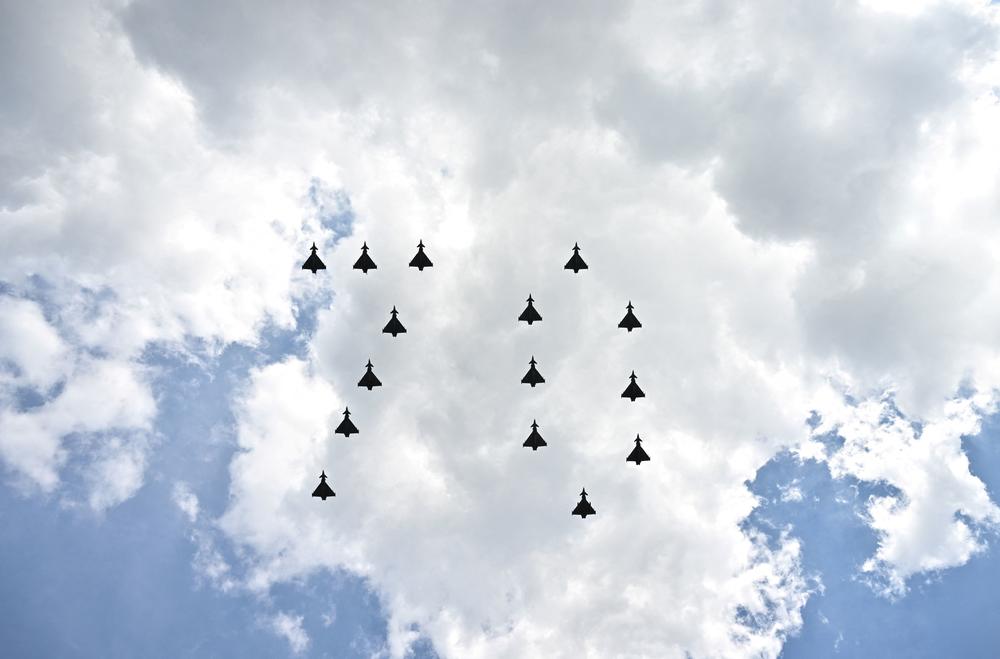 Fighter jets from Britain's Royal Air Force fly in formation to form the number 70 over a Buckingham Palace balcony following the Trooping the Color parade, as part of Queen Elizabeth II's Platinum Jubilee celebrations.