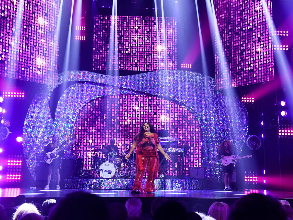 Lizzo performs onstage during the YouTube Brandcast 2022 in May.