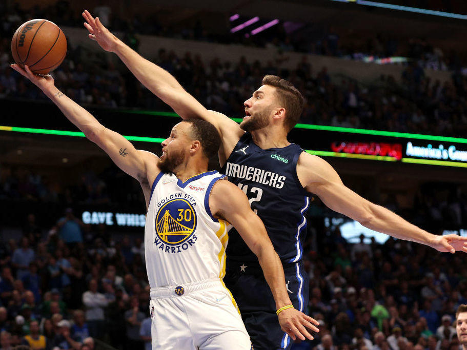 Stephen Curry of the Golden State Warriors drives to the basket against Maxi Kleber of the Dallas Mavericks during the Western Conference Finals.