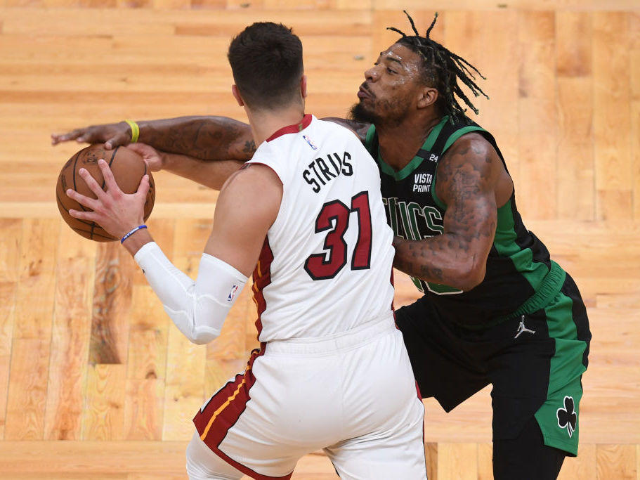 Marcus Smart of the Boston Celtics defends against Max Strus of the Miami Heat during Game 6 of the Eastern Conference Finals.