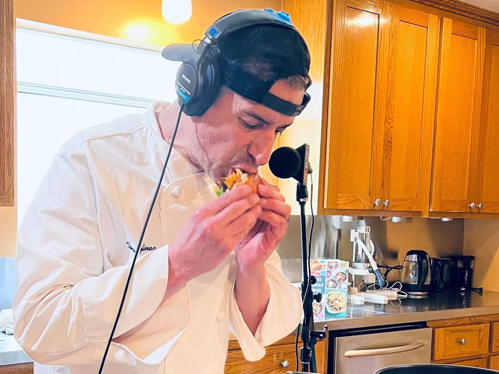 NPR's A Martínez bites into the plant-based burger.
