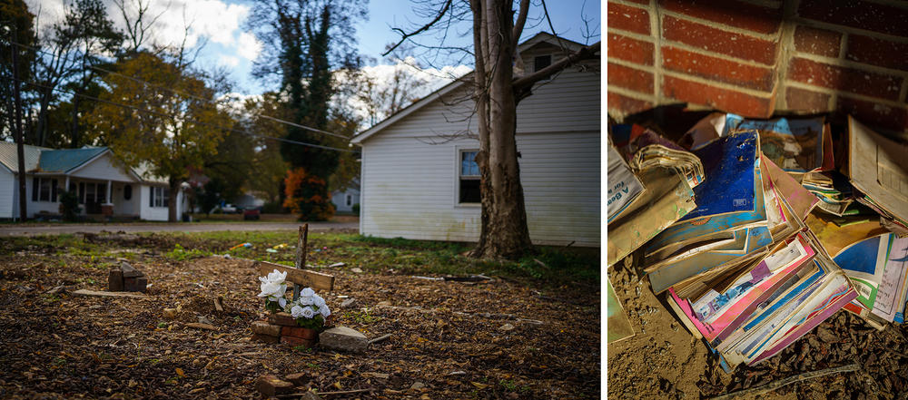 Makeshift memorials as well as destroyed school supplies serve as a reminder of the floods that ripped through the town.