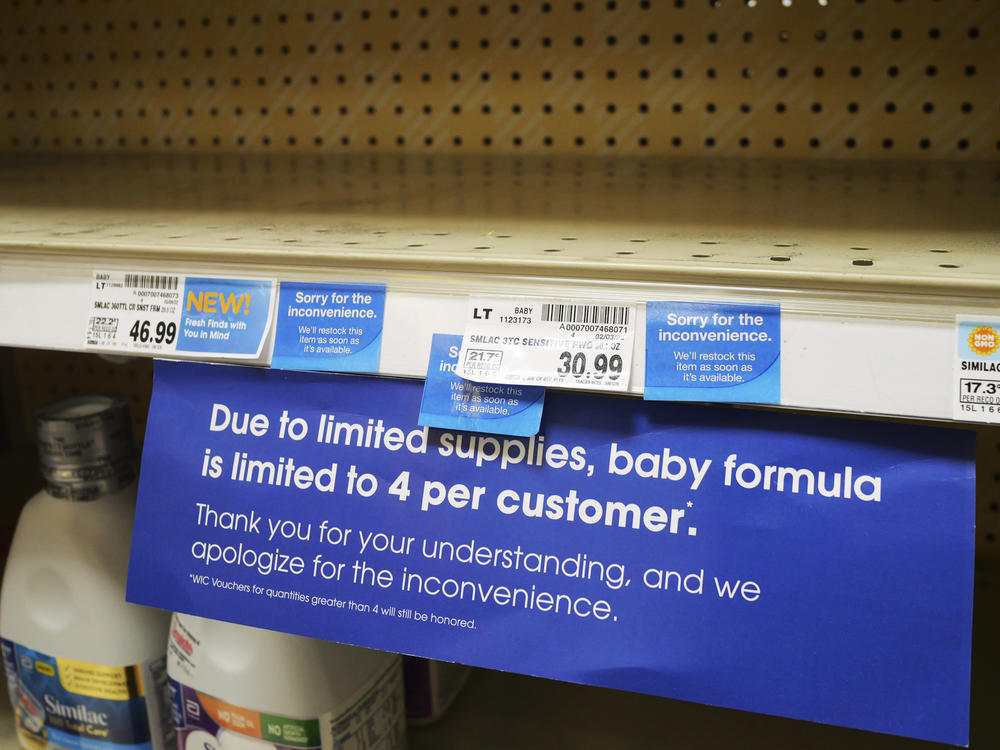 A sign limiting baby formula purchases is seen on a shelf at a grocery store in Salt Lake City.