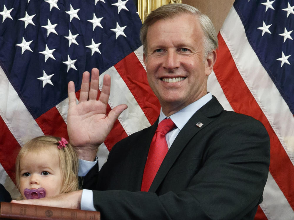 Congressman Chris Jacobs, R-N.Y., poses for a photo with his daughter Anna, 1, during a ceremonial swearing-in on Capitol Hill, on July 21, 2020, in Washington. Jacobs says he will not run for another term in Congress amid backlash over his support for new gun control measures.