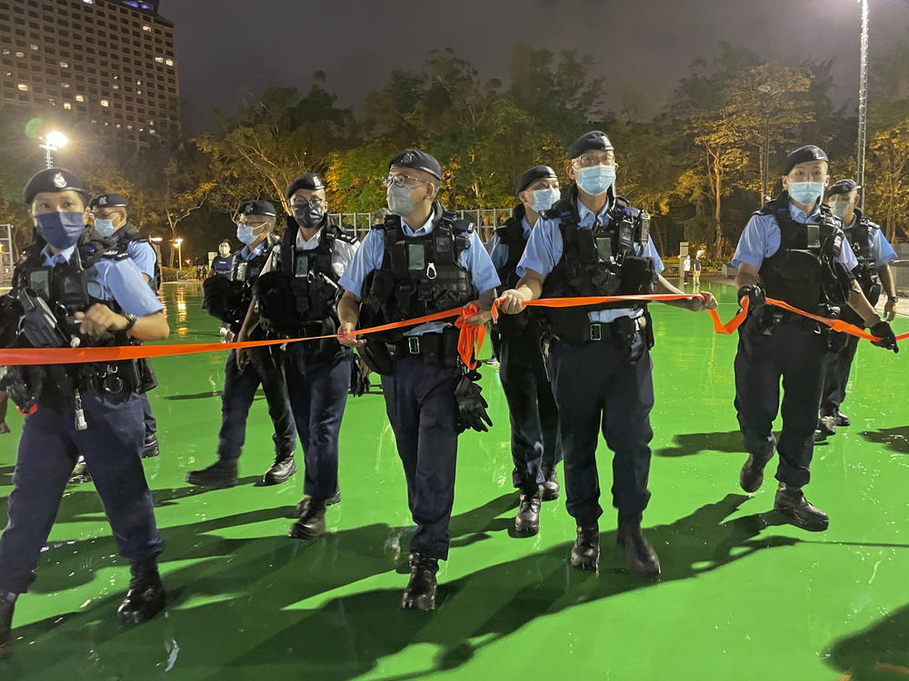 Police officers on Friday set up a cordon as Hong Kong authorities announced a temporary closure of the Victoria Park where the candlelight vigil used to be held to commemorate the June 4, 1989 military crackdown in Beijing's Tiananmen Square on a pro-democracy student movement.