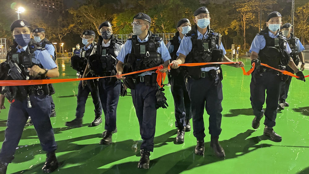 Police officers on Friday set up a cordon as Hong Kong authorities announced a temporary closure of the Victoria Park where the candlelight vigil used to be held.