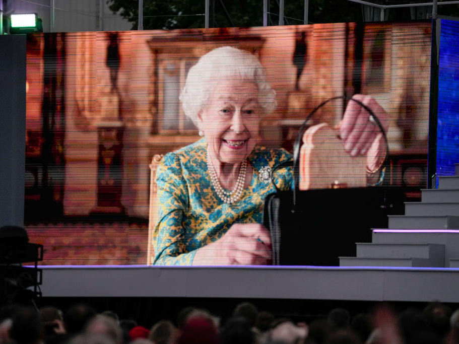 Queen Elizabeth II shows off a marmalade sandwich in a video with Paddington Bear shown during the Platinum Party At The Palace at Buckingham Palace on June 4.
