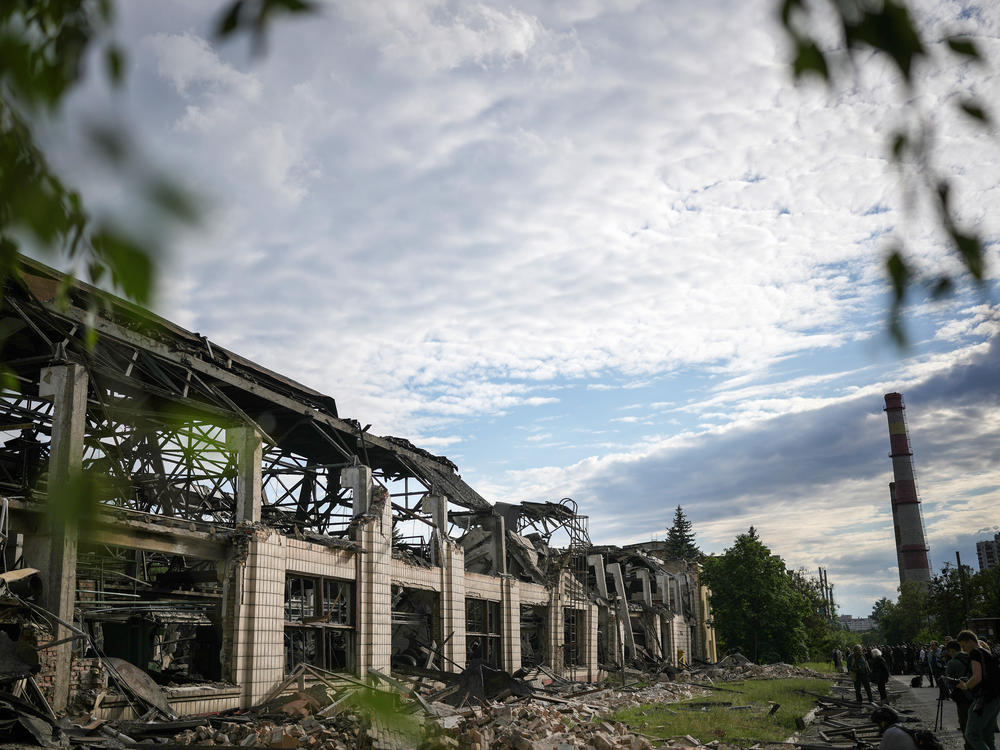 Extensive damage can be seen to a railcar repair facility in Kyiv on Sunday.