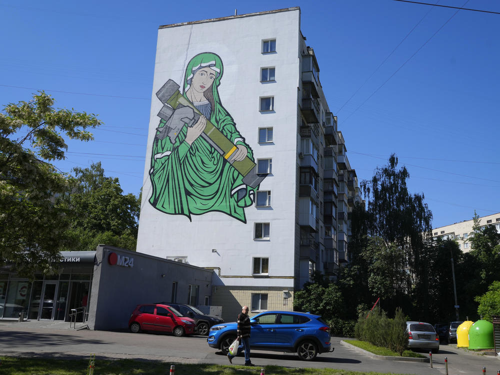 A mural on a wall in Kyiv on Monday depicts an image of 