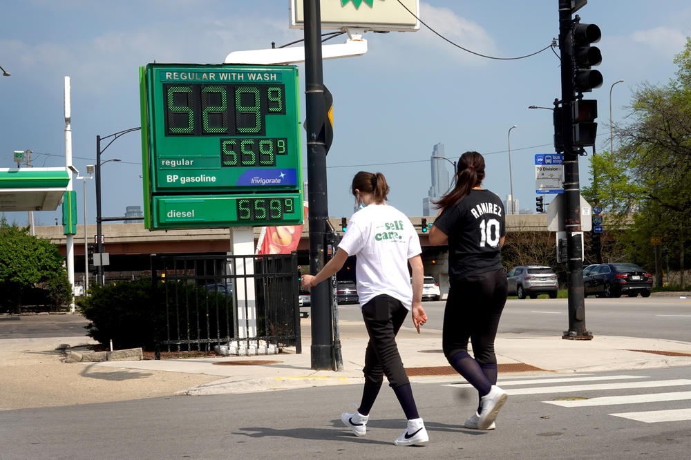 A sign displays gas prices that are over $5 a gallon in Chicago on May 10.