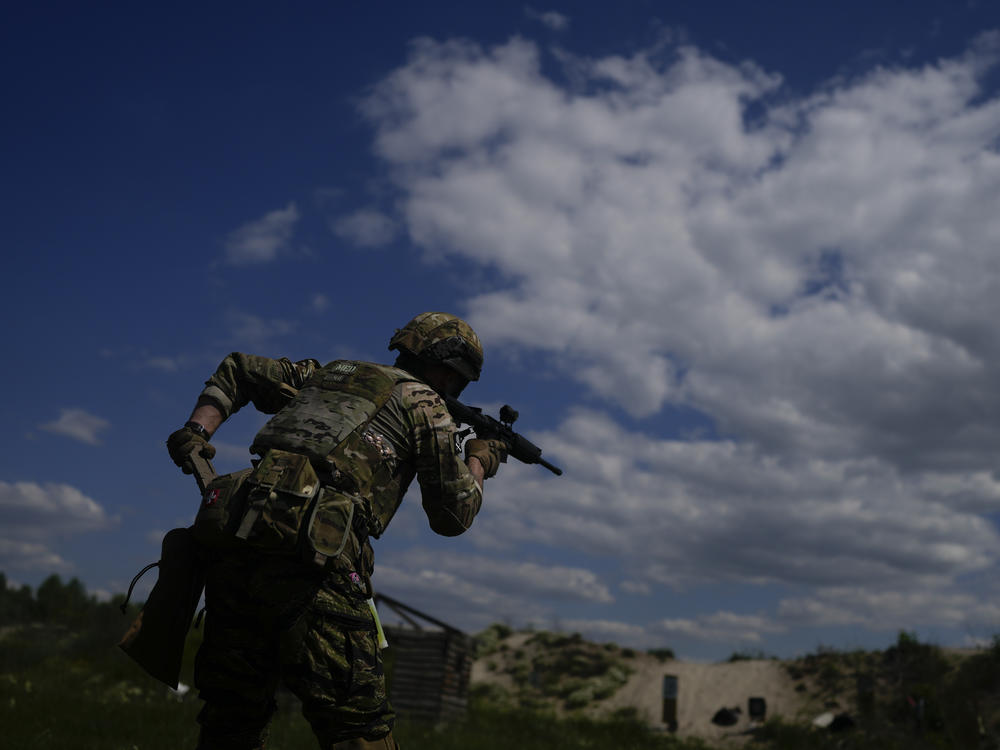 A civilian militia member holds a rifle during training at a shooting range on the outskirts of Kyiv on Tuesday.
