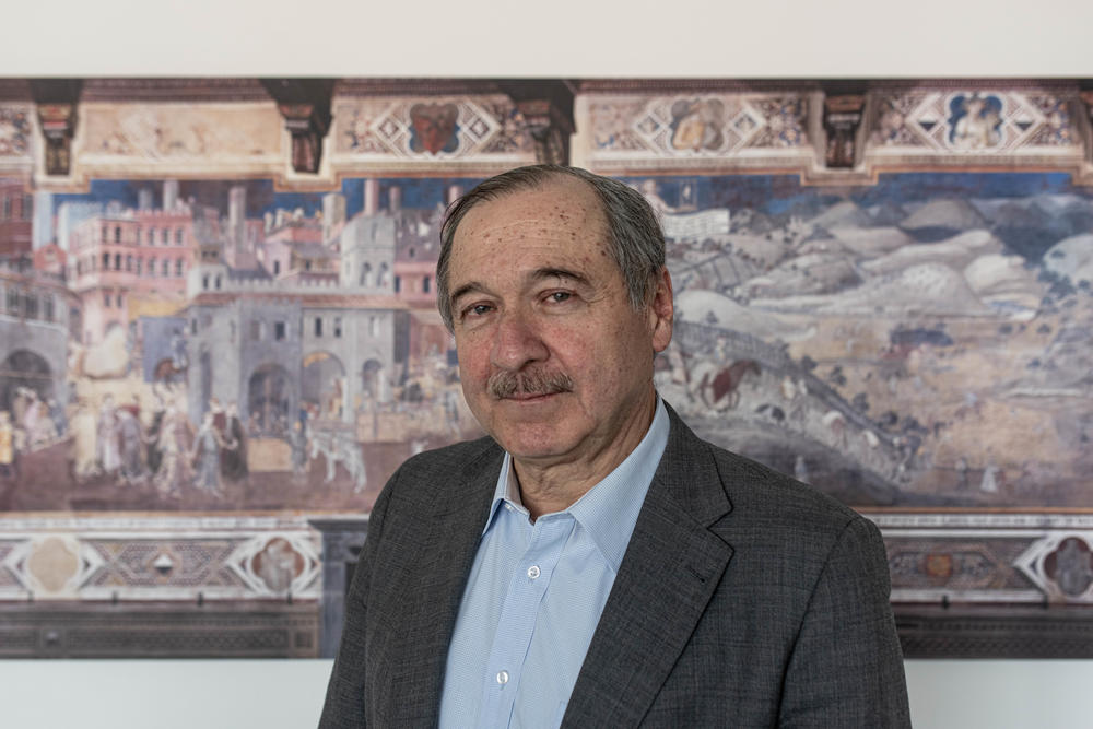 Eduardo Cifuentes is the president of the Special Jurisdiction for Peace, a tribunal set up to prosecute war crimes in Colombia. Here he shows an Italian Renaissance painting made by Ambrogio Lorenzetti called <em>The Allegory of Good and Bad Government</em>.