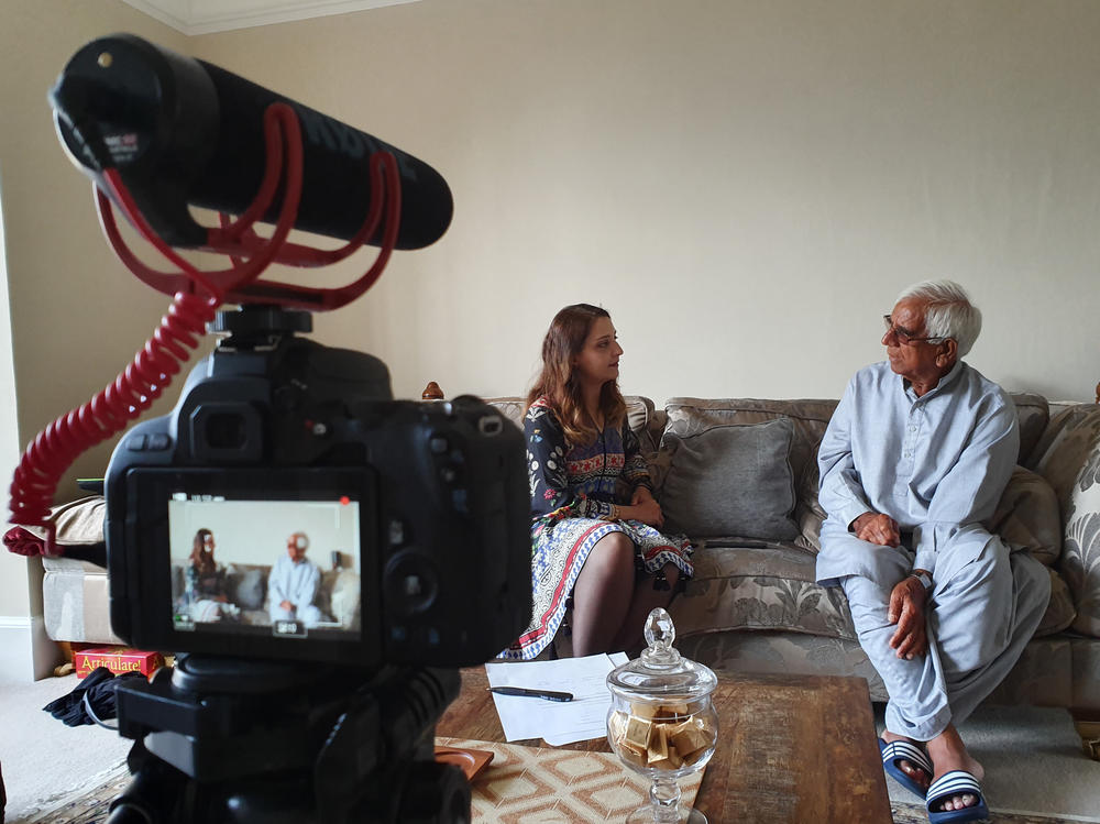 Saadia Gardezi (left), a cofounder of Project Dastaan, interviews Partition survivor Bahadur Ali Phambra in London.