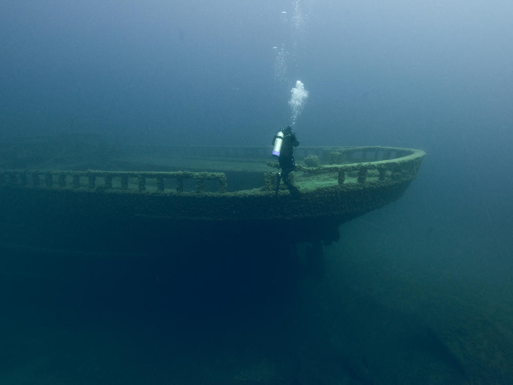A diver explores Grecian shipwreck at Thunder Bay National Marine Sanctuary.