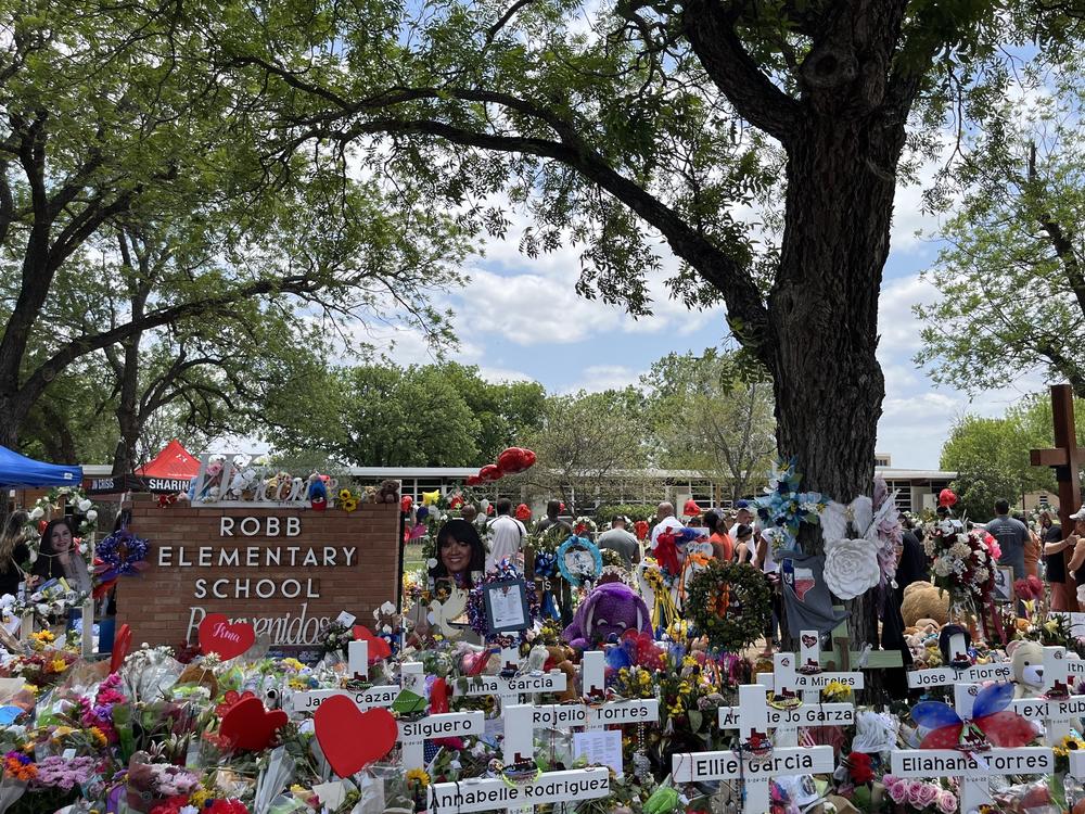 The trees that George Garza planted as a new teacher in the 1960s today offer shade at the memorial to the victims of the mass shooting at Robb Elementary School in Uvalde, Texas.