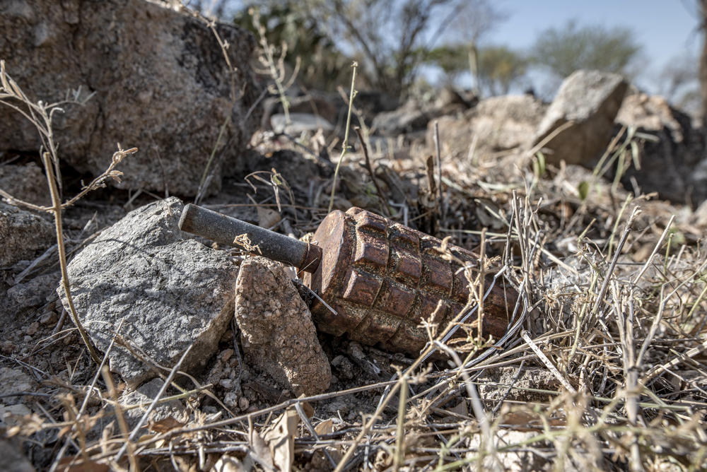A Soviet-made POMZ-2M anti-personnel landmine lies where it was discovered by one of Angola's all-female demining team. The mine will be destroyed using an explosive charge.