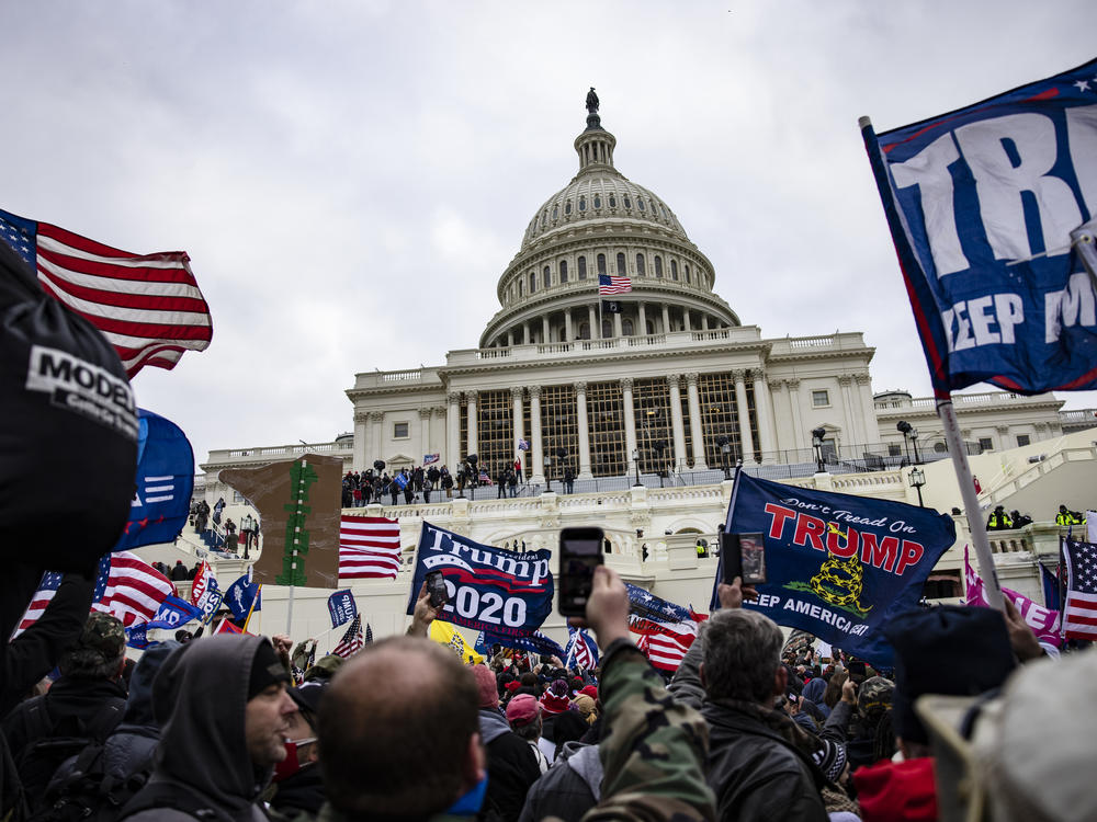 Pro-Trump supporters storm the U.S. Capitol following a rally with President Donald Trump on Jan. 6, 2021, in Washington, D.C. They later went on to break in and attempt to stop the certification of the 2020 presidential election results.