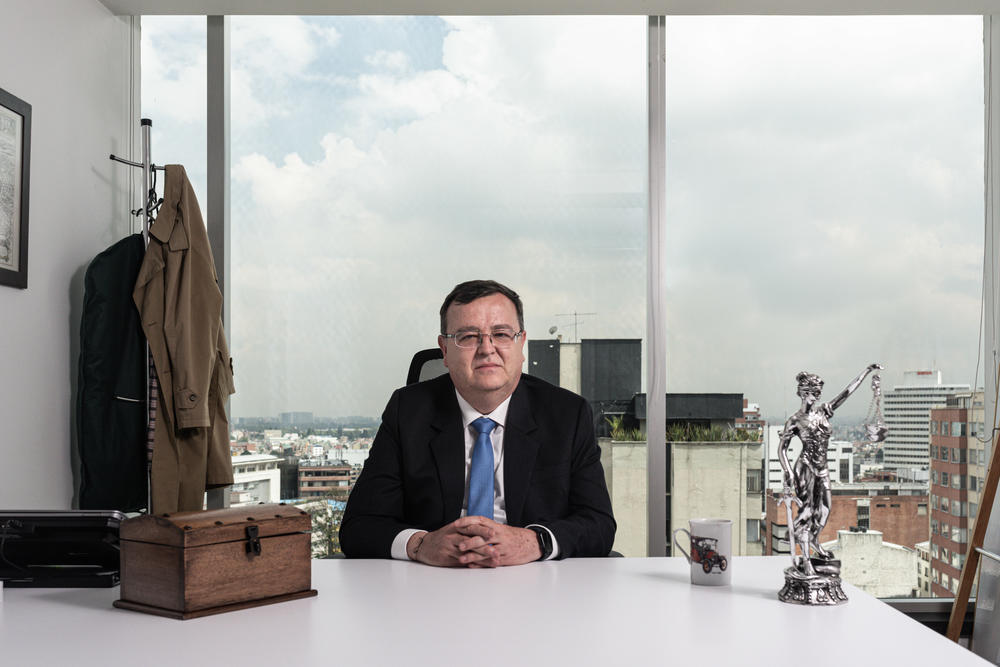 Alejandro Ramelli, one of the judges who heard the case of alleged extrajudicial killings in Ocaña, sits in his office in Bogotá on June 8.