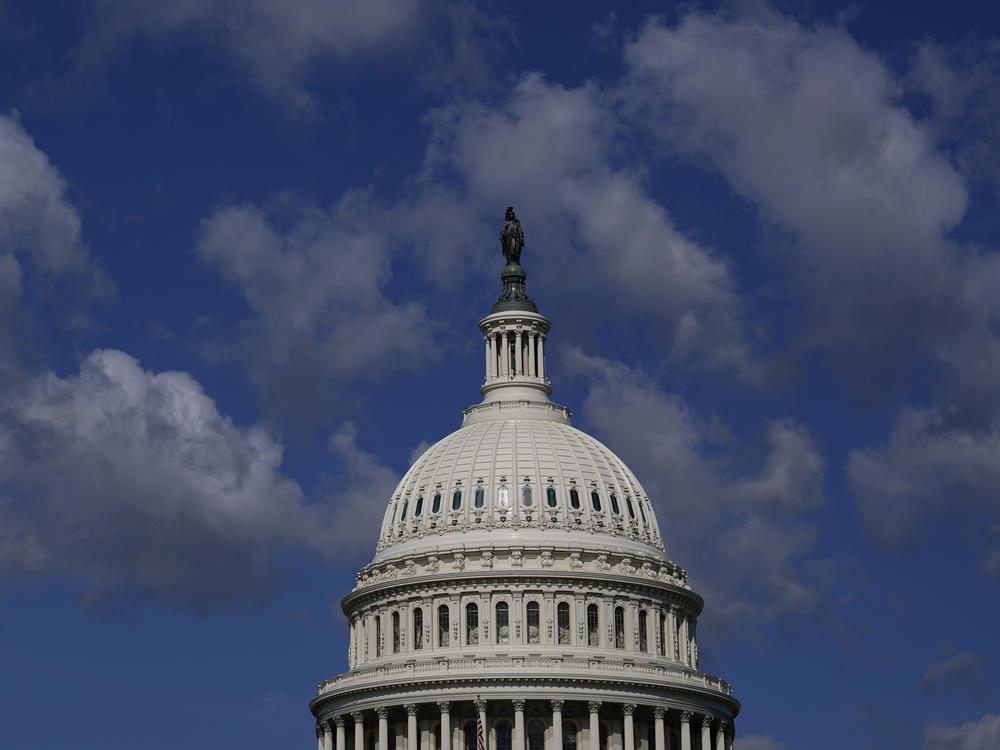 Clouds roll over the U.S. Capitol dome in Washington on Thursday.
