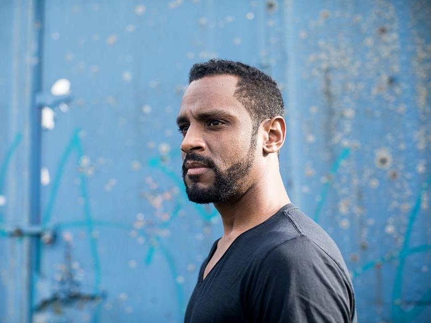 Composer Carlos Simon's <em>Requiem for the Enslaved</em>, commissioned by Georgetown University, is a reckoning with the school's troubled history.