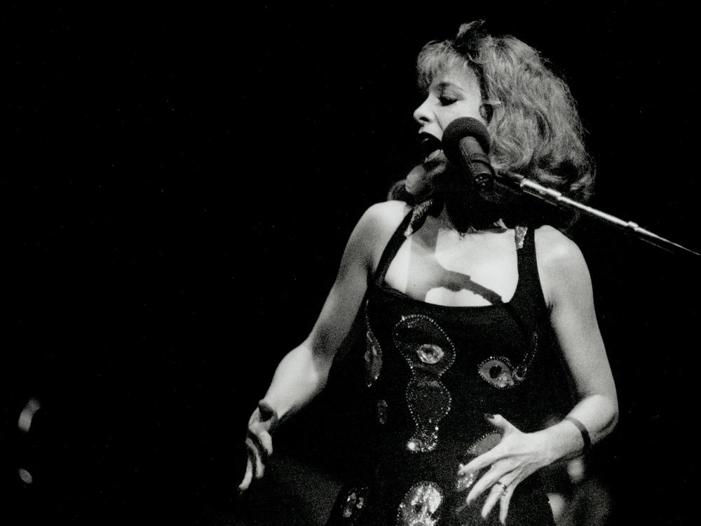 In the '90s, Julee Cruise filled in for The B-52s member Cindy Wilson on tour. The singer is best known for her work with David Lynch on <em>Twin Peaks</em> and <em>Blue Velvet</em>.