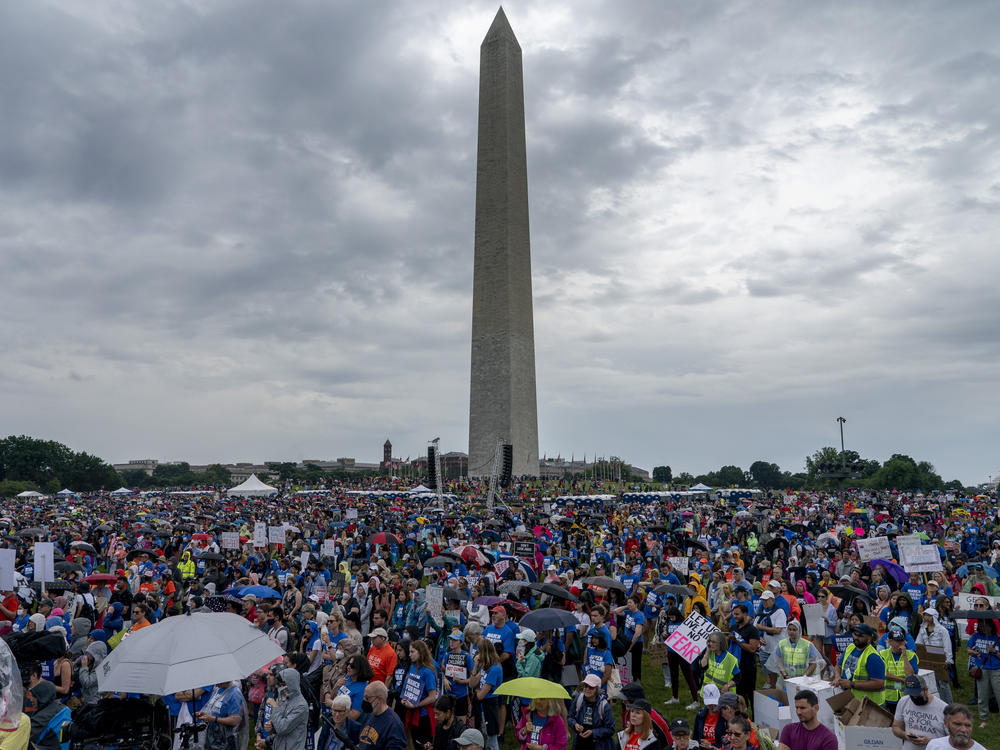 People participate in the second March for Our Lives rally in support of gun control in front of the Washington Monument in Washington, D.C.