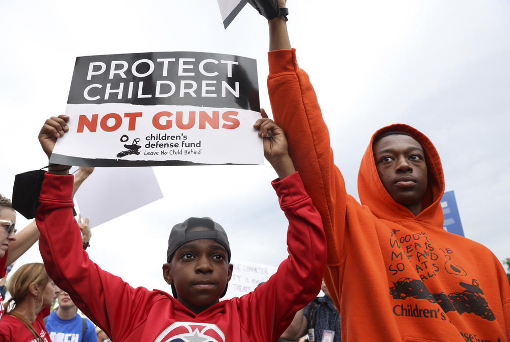 Demonstrators attend a March for Our Lives rally against gun violence on the National Mall in Washington, D.C.
