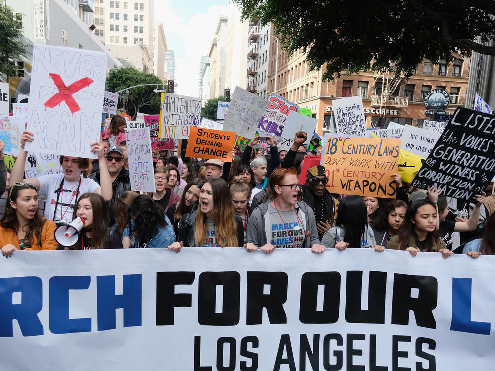 March for Our Lives demonstrators at a rally in Los Angeles in 2018. The activist group can typically be spotted donning blue and white colors. Meanwhile, the March for Life movement is often seen with red and white colors.