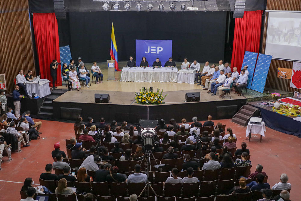 Accusers face former Colombian army officers in the second day of special tribunal hearings in Ocaña, Colombia, on April 27.