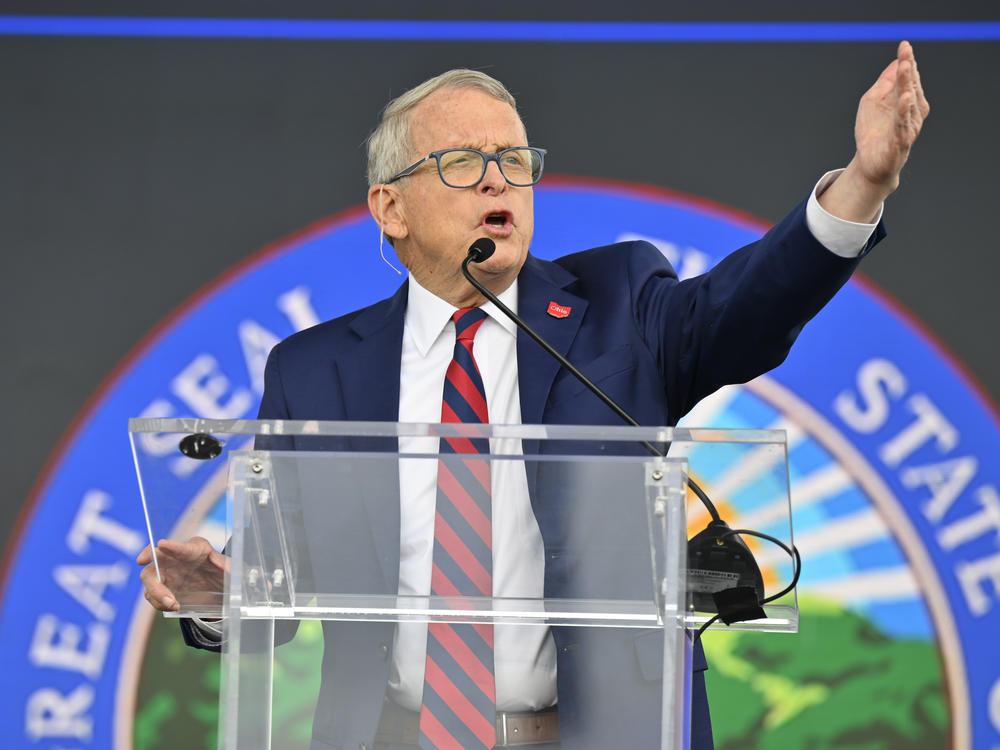 Ohio Gov. Mike DeWine, seen here at a news conference earlier this month, says the move to make it easier for teachers to carry guns will give school districts more options.