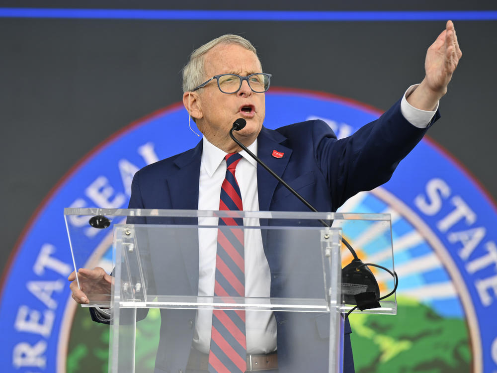 Ohio Gov. Mike DeWine, seen here at a news conference earlier this month, says the move to make it easier for teachers to carry guns will give school districts more options.