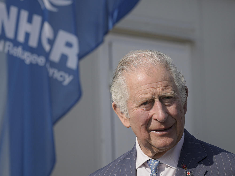 Britain's Prince Charles arrives at a center for refugees fleeing the war in neighboring Ukraine, inside the Romexpo convention center, in Bucharest, Romania, May 25, 2022.