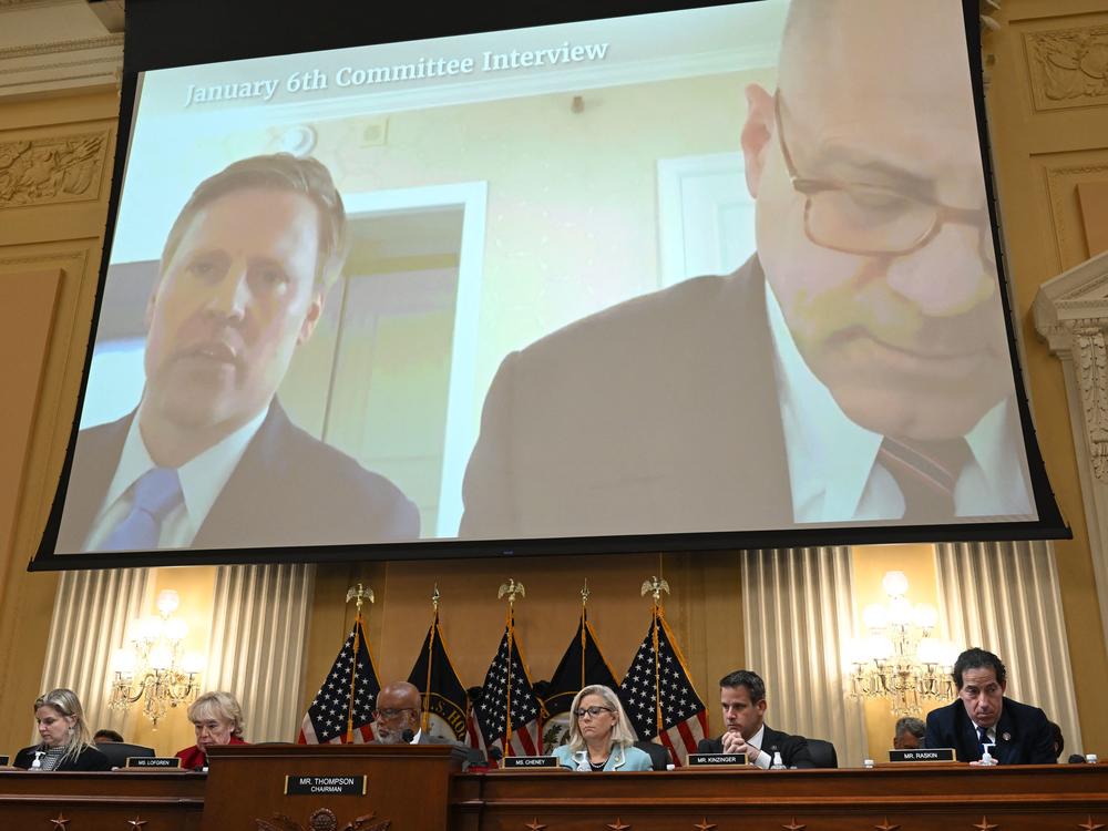 Video from an interview with former President Trump campaign manager William Stepien, left, and his attorney Kevin Marino is played during Monday's Jan. 6 committee hearing.