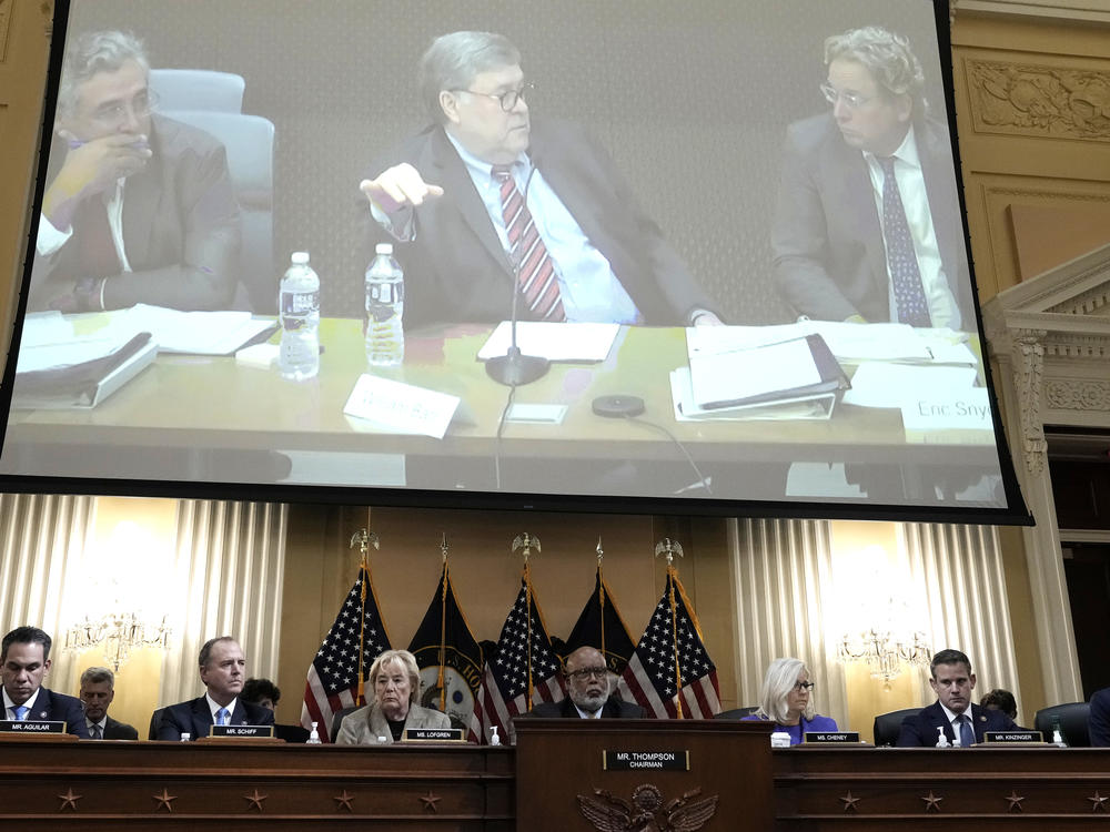Former Attorney General Bill Barr is seen on a screen during a hearing held by the House Jan. 6 committee on Monday.