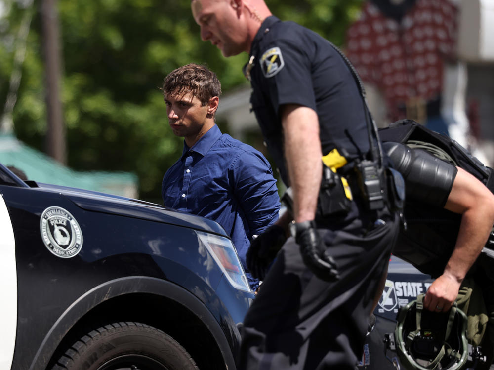 Law enforcement detains 31 members of the white nationalist group Patriot Front after they were removed from a U-Haul truck near the LGBTQ+ community's 