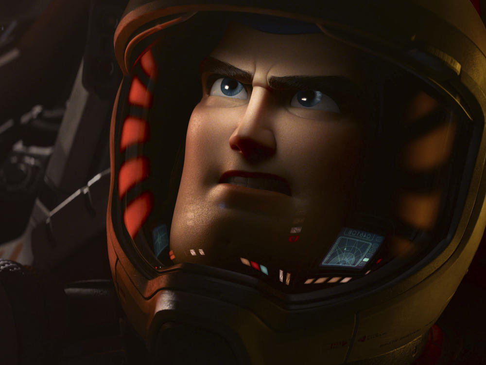 This image released by Disney/Pixar shows character Buzz Lightyear, voiced by Chris Evans, in a scene from the animated film 
