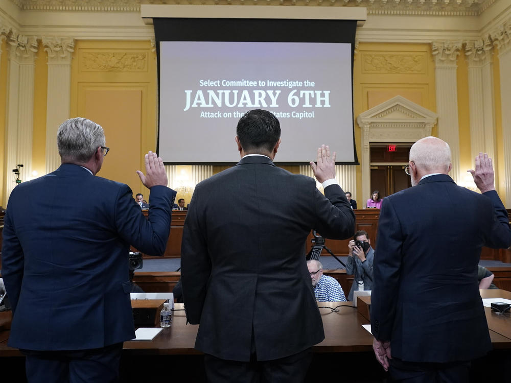 Witnesses swear in before a House select committee investigating the Jan. 6 attack on the U.S. Capitol hearing on Monday.