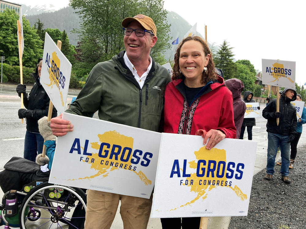 Al Gross, left, an independent running for Alaska's U.S. House seat, poses beside his wife, Monica Gross, on June 11, 2022, in Juneau, Alaska.