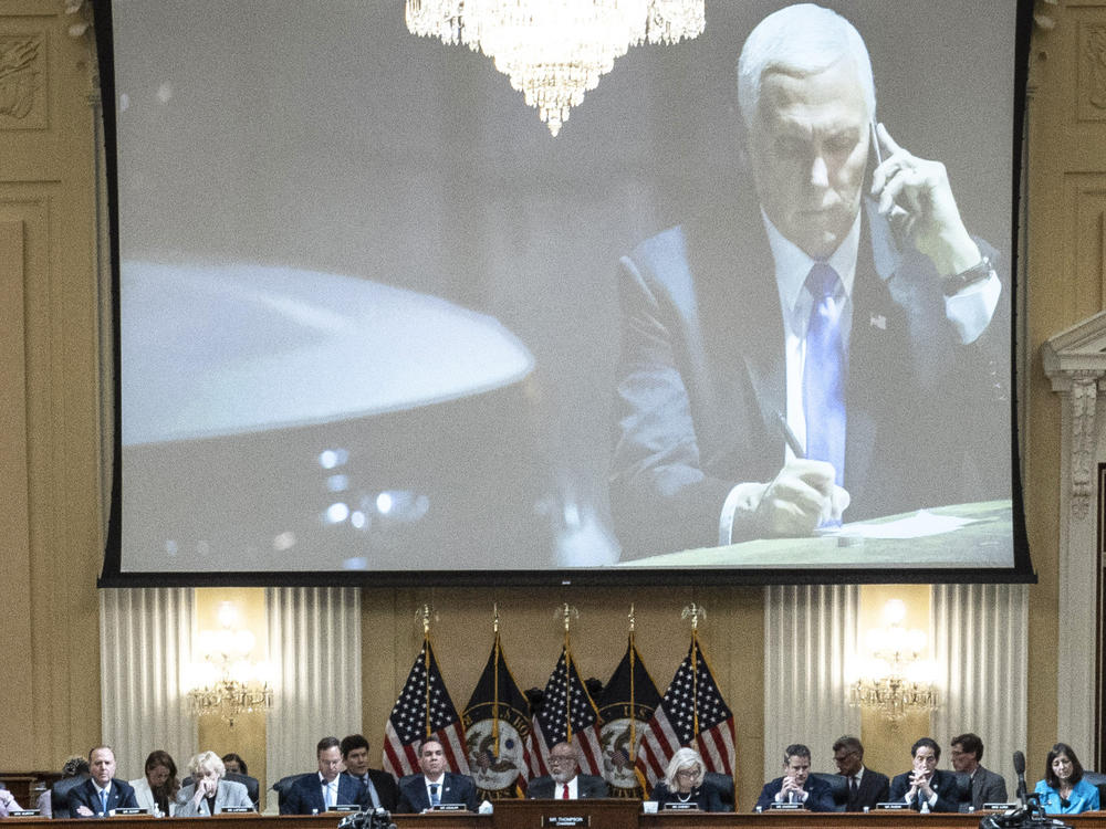 A committee exhibit shows former Vice President Mike Pence on the phone from his secure location during the riot, as the House select committee investigating the Jan. 6, 2021, attack on the Capitol holds a hearing in Washington, Thursday, June 16, 2022. (Drew Angerer/Pool Photo via AP)