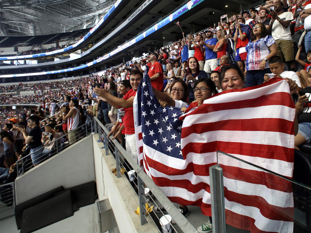 Fan cheer on the U.S. during a World Cup watch party in 2014 at AT&T Stadium, in Arlington, Texas. The arena is among those in contention to host matches during the 2026 World Cup.