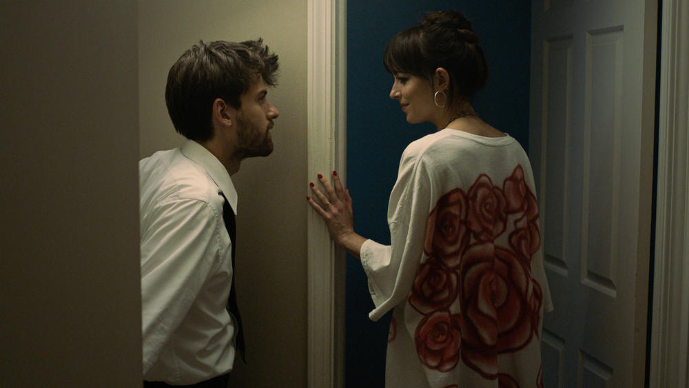 Cooper Raiff plays a recent college grad and Dakota Johnson is a single mom in the Apple TV+ film <em>Cha Cha Real Smooth.</em>